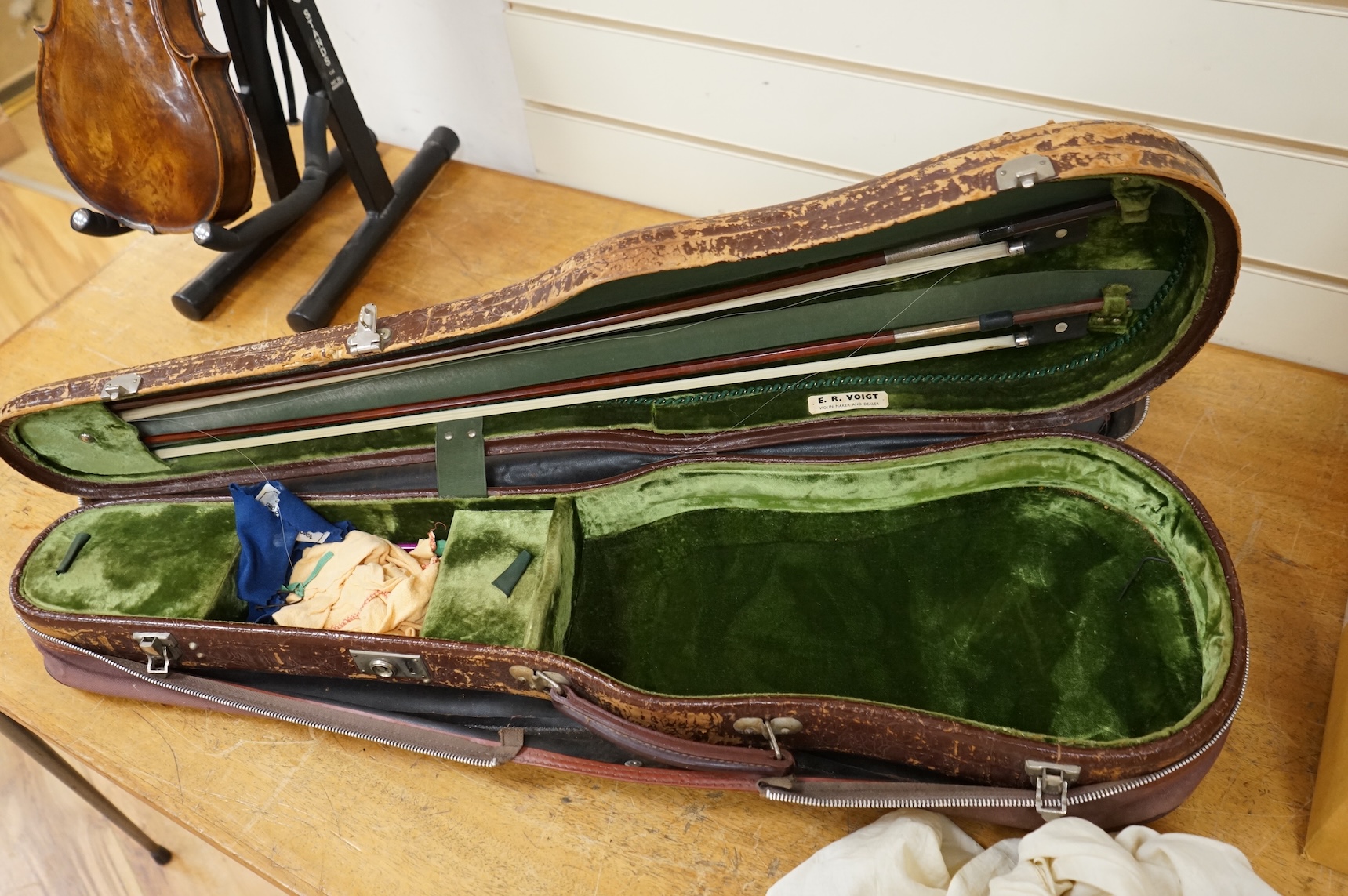 An interesting late 18th century violin, with one piece bird’s eye maple back, unsigned, with two silver fully mounted octagonal bows, one stamped Voight CITES Submission reference, 3XFNUBT7 and Submission reference, RHL